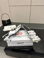 White Balenciaga women's slingback sandals with striped bands and thin heel