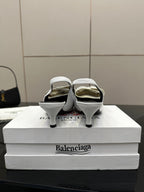 White Balenciaga women's heeled slingback sandals shown from the back