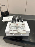 White Balenciaga women's heeled slingback sandals with buckle ankle strap