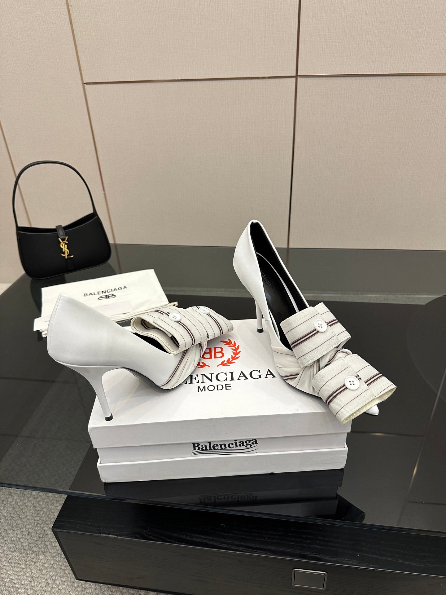 Balenciaga women\u2019s heeled mules with striped wrap strap and buckle detail, white