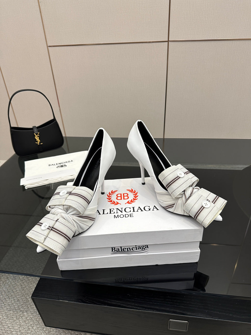 Balenciaga women\u2019s heeled shoes with striped strap detail and buckles, white