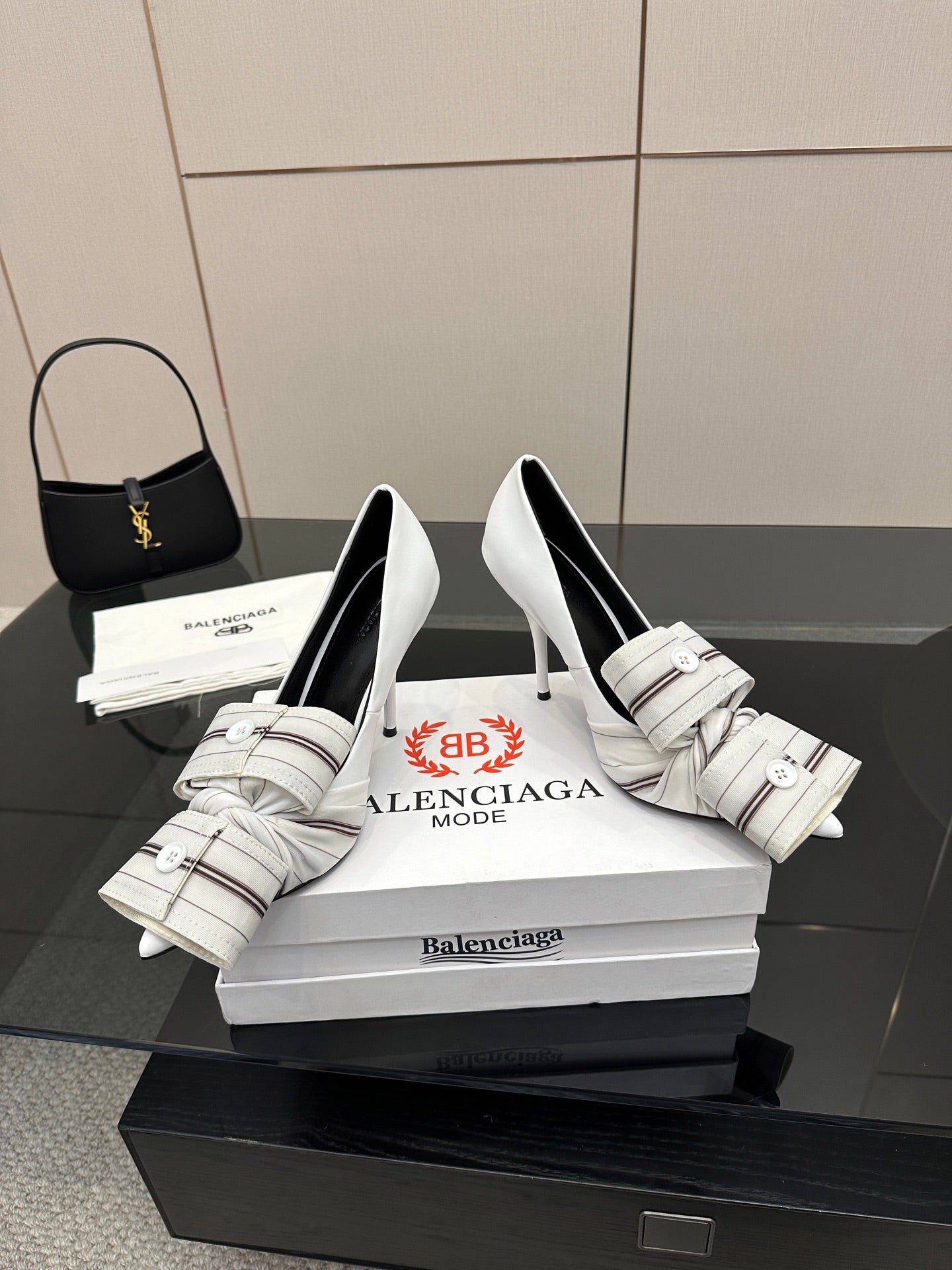 Balenciaga women\u2019s heeled shoes with striped strap detail and buckles, white