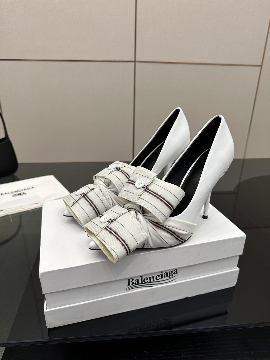 Balenciaga women\u2019s white heeled mules with striped band straps and buckles