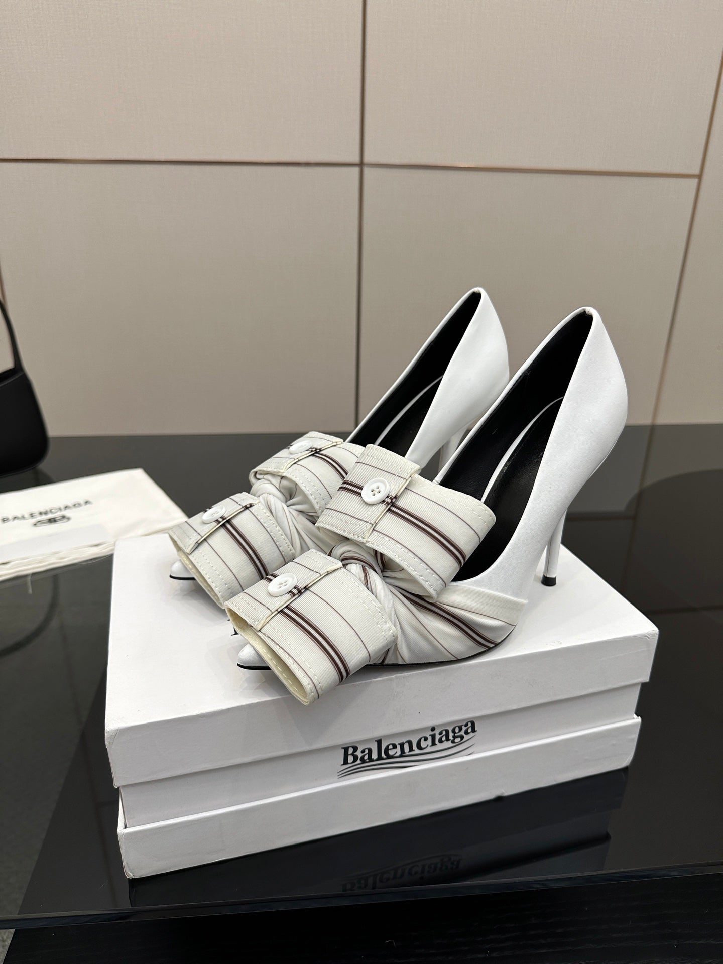 Balenciaga women\u2019s white heeled mules with striped band straps and buckles