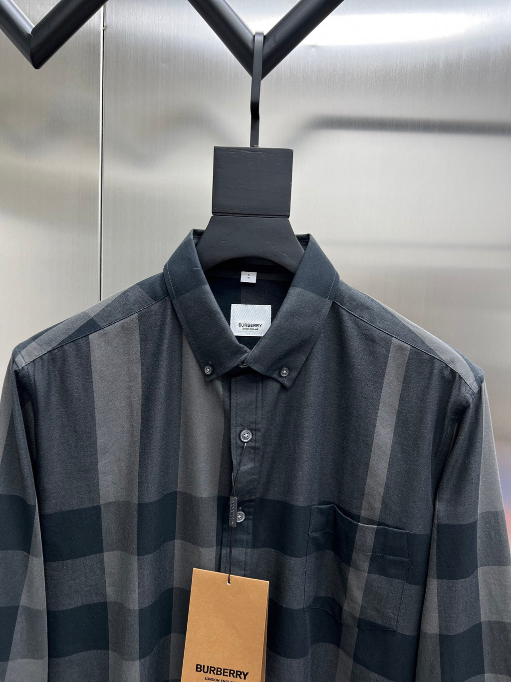 Burberry plaid button-up shirt with collar and buttons, dark gray and navy check