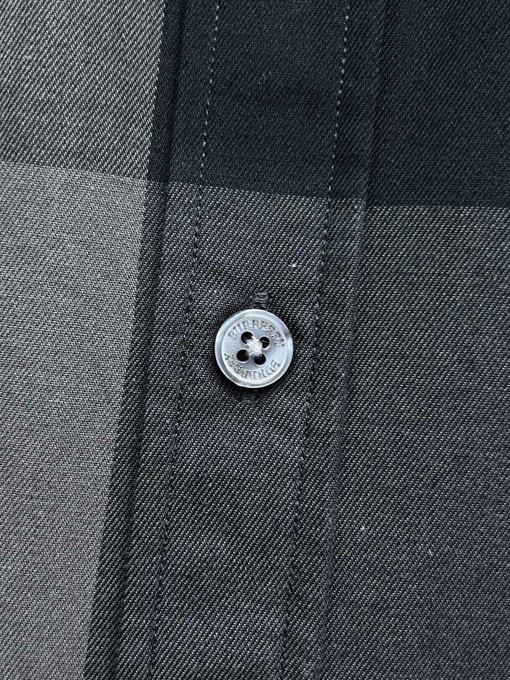 Burberry plaid shirt button with embossed logo, dark gray and navy check