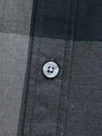 Burberry plaid shirt button with embossed logo, dark gray and navy check