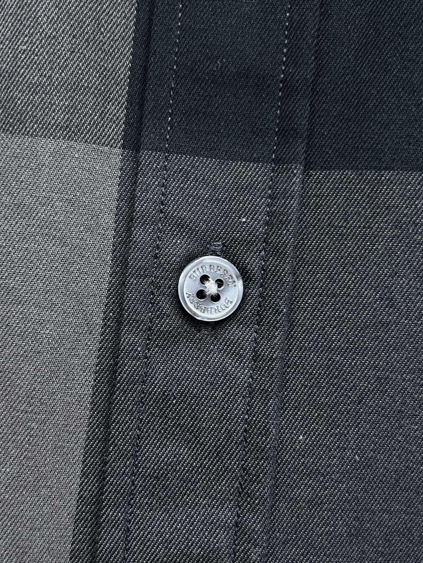 Burberry plaid shirt button with embossed logo, dark gray and navy check