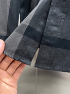 Burberry plaid shirt cuff hem with buttonhole detail, dark gray and navy check