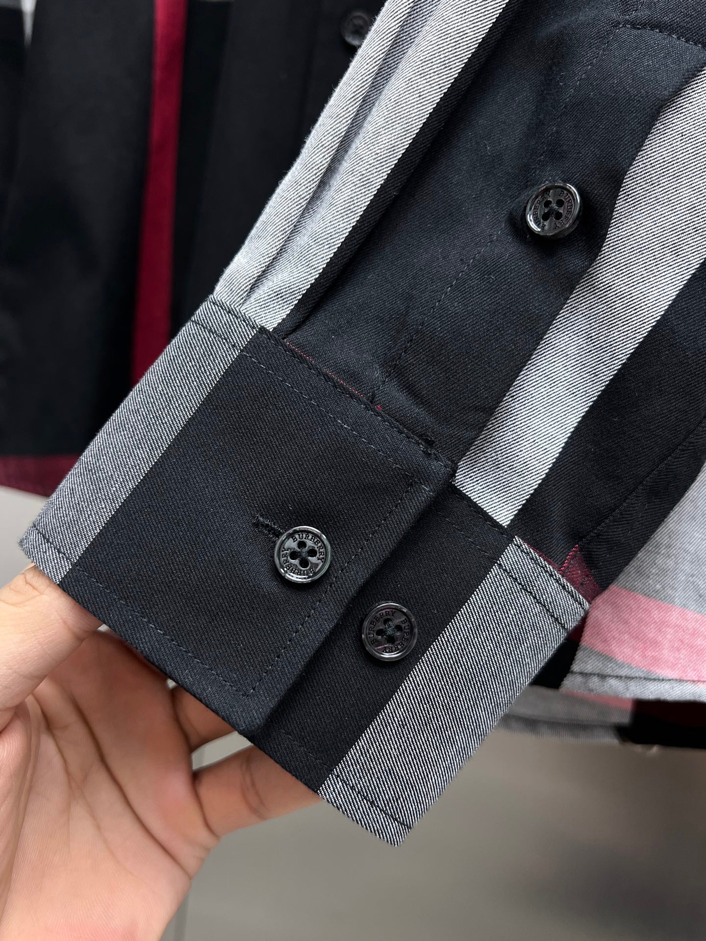 Burberry long-sleeve check shirt placket with buttons and gray-trim cuffs