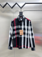 Black, white, and red plaid long-sleeve button-up shirt with pointed collar