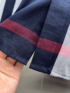 Long-sleeve plaid shirt cuff with check trim and stitched hem