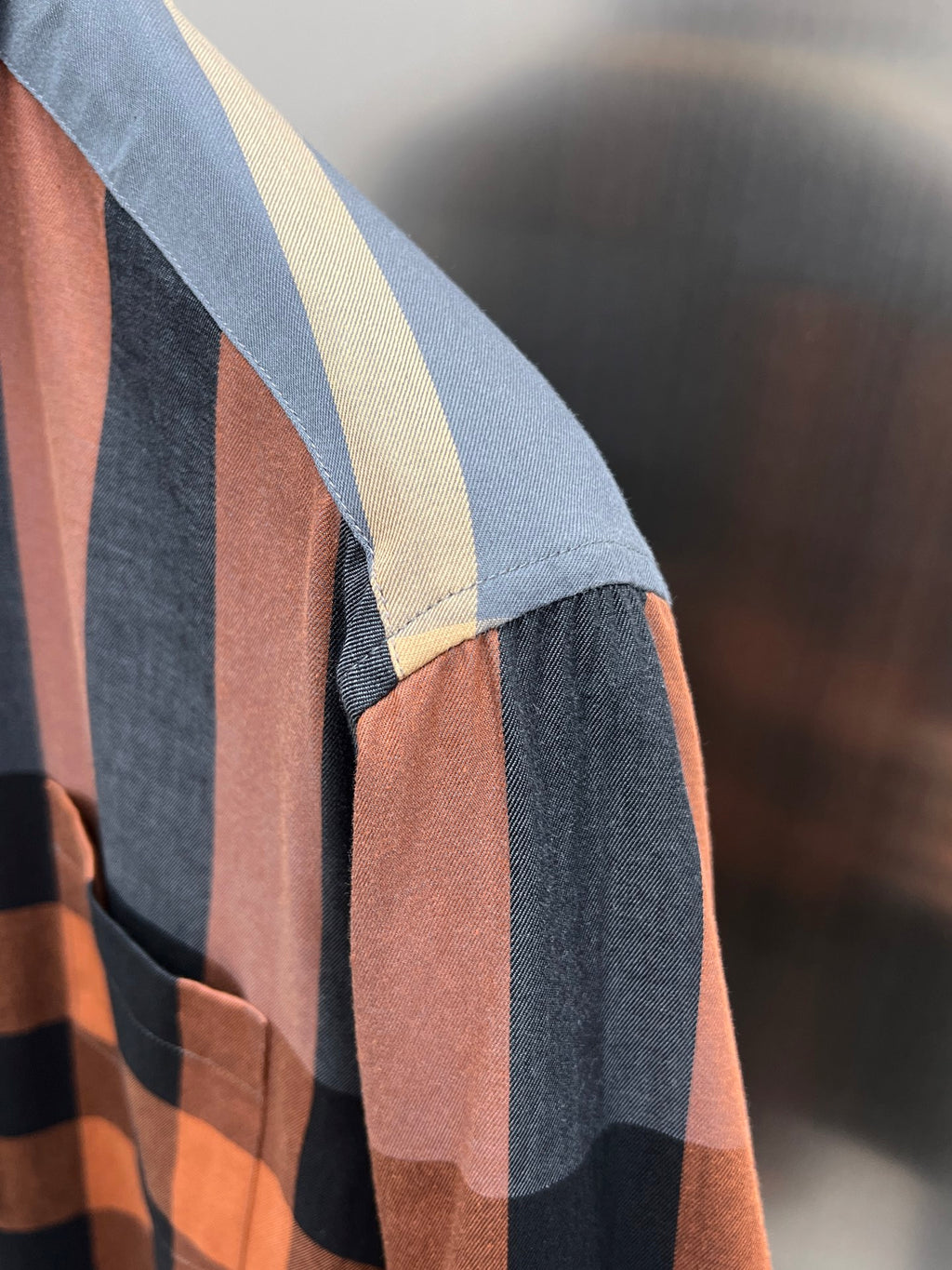 Plaid long-sleeve shirt sleeve panel with contrast stripe and folded cuff