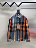 Plaid long-sleeve button-up shirt with collar, front button placket, and hanging tag