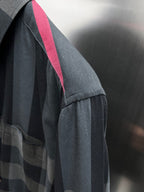 Burberry plaid button-up shirt sleeve with vertical red accent stripe