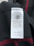 Burberry care label on dark plaid long-sleeve shirt, 100% cotton