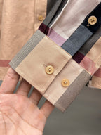 Plaid shirt cuff with two buttons, beige and burgundy and gray checks