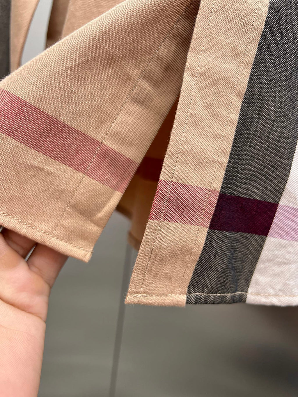 Plaid sleeve cuff with buttoned hem, beige and burgundy and gray checks