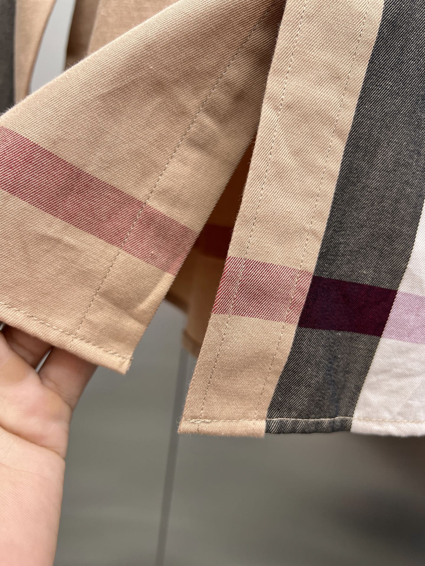 Plaid sleeve cuff with buttoned hem, beige and burgundy and gray checks