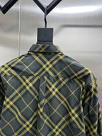 Back of long-sleeve plaid shirt with yoke and button placket