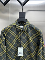 Plaid long-sleeve button-up shirt with pointed collar and chest logo tag