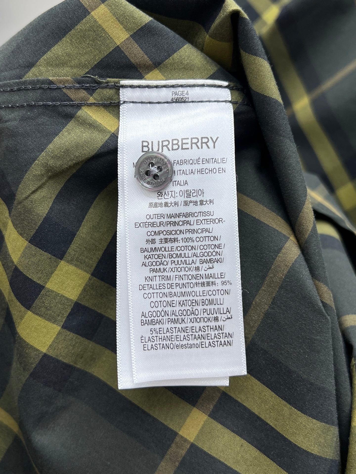 Inside neck label with Burberry logo on plaid long-sleeve shirt