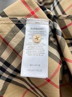 Burberry plaid button-up shirt interior neck label with size and care details