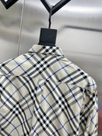 Checkered long-sleeve shirt on hanger with back yoke seam