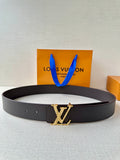 Louis Vuitton belt with dark leather strap and gold-tone monogram buckle