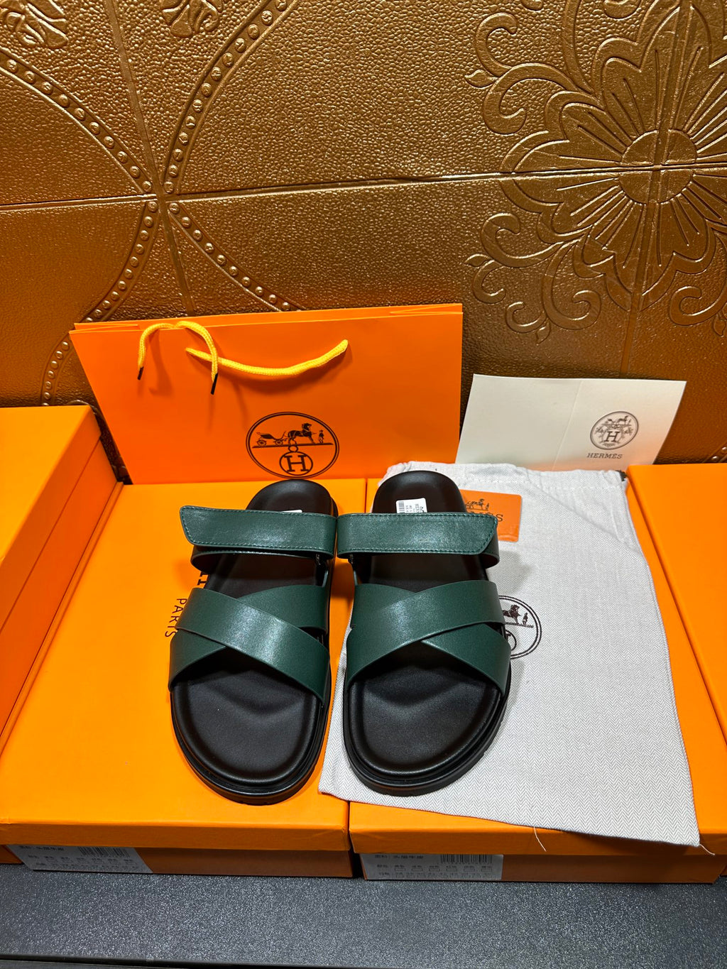 Hermes sandals with teal green wide straps and black cushioned footbeds