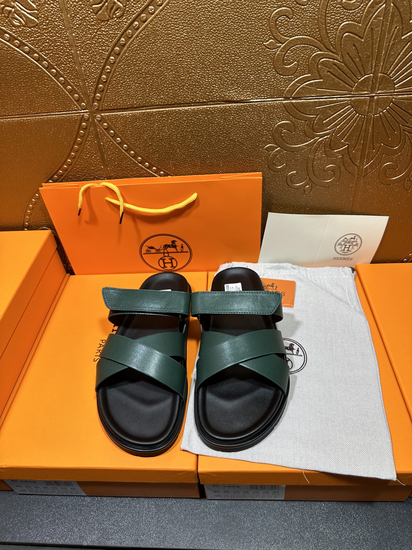 Hermes sandals with teal green wide straps and black cushioned footbeds