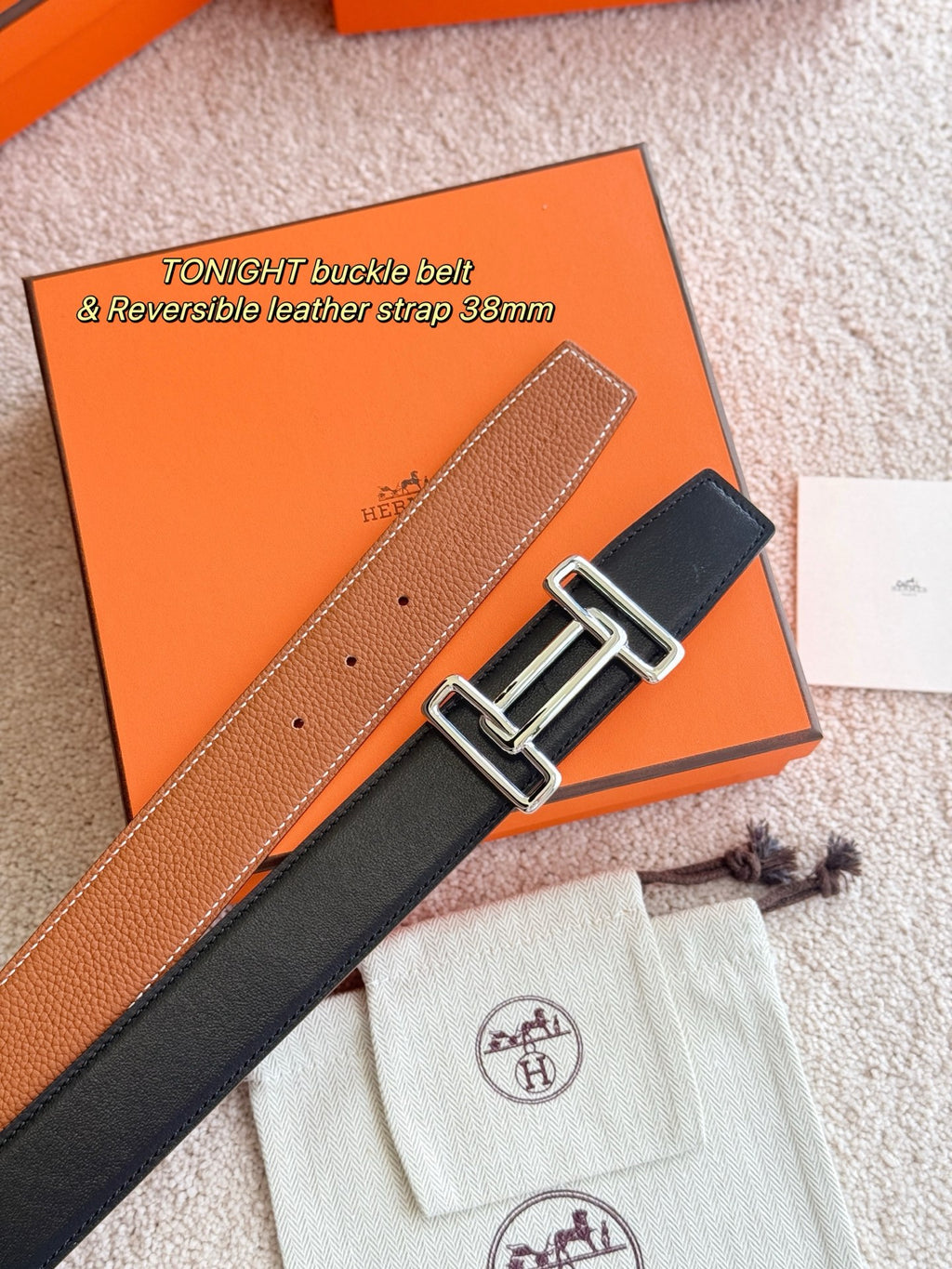 Two-sided reversible belt, brown and dark leather with silver buckle