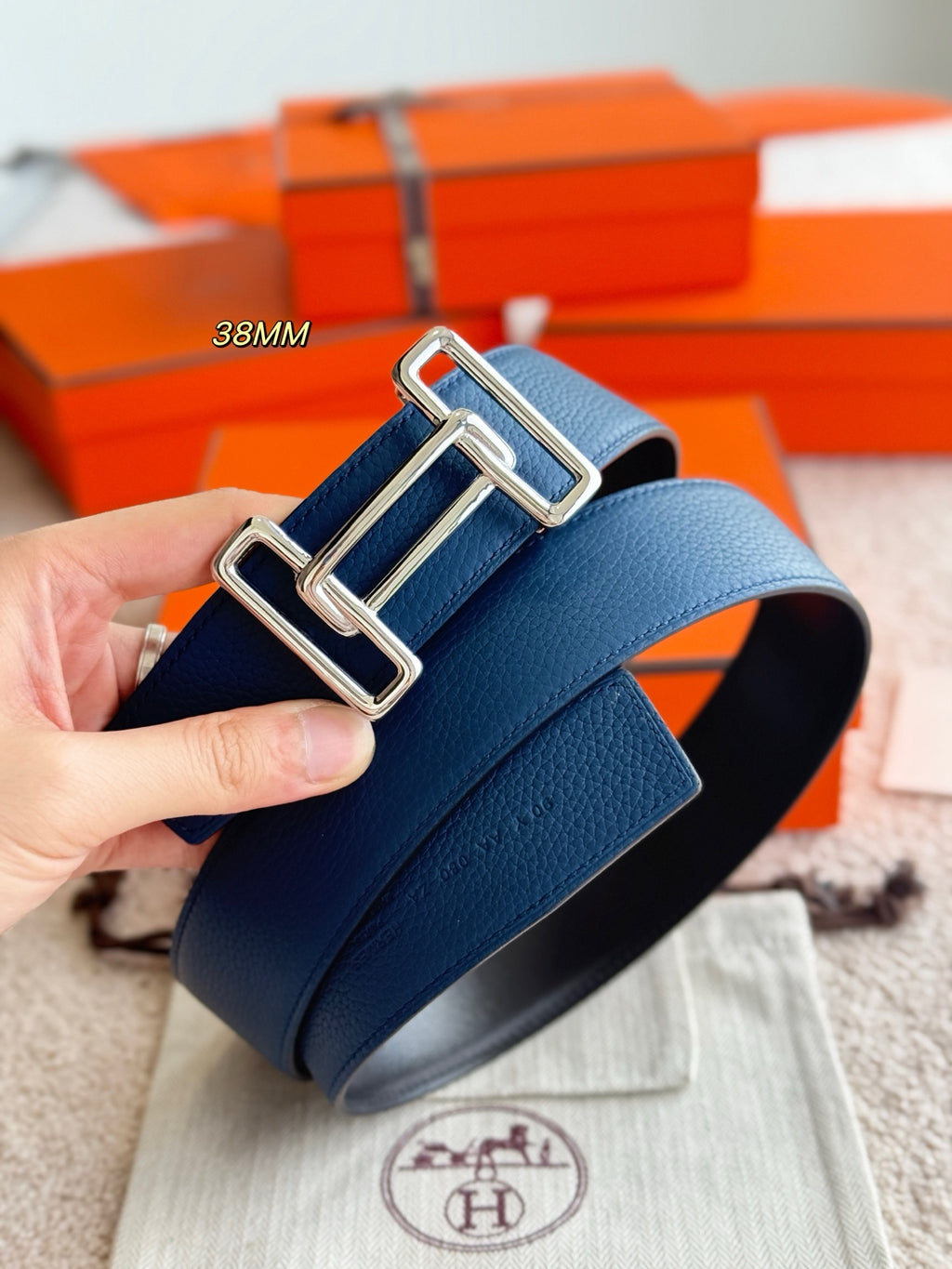 Hermes reversible leather belt with blue grain finish and silver double-prong buckle