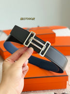 Hermes reversible leather belt with dark blue and black straps and silver double-prong buckle