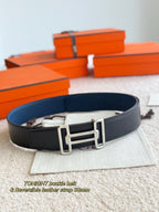 Hermes leather belt with dark blue strap and silver double-prong buckle
