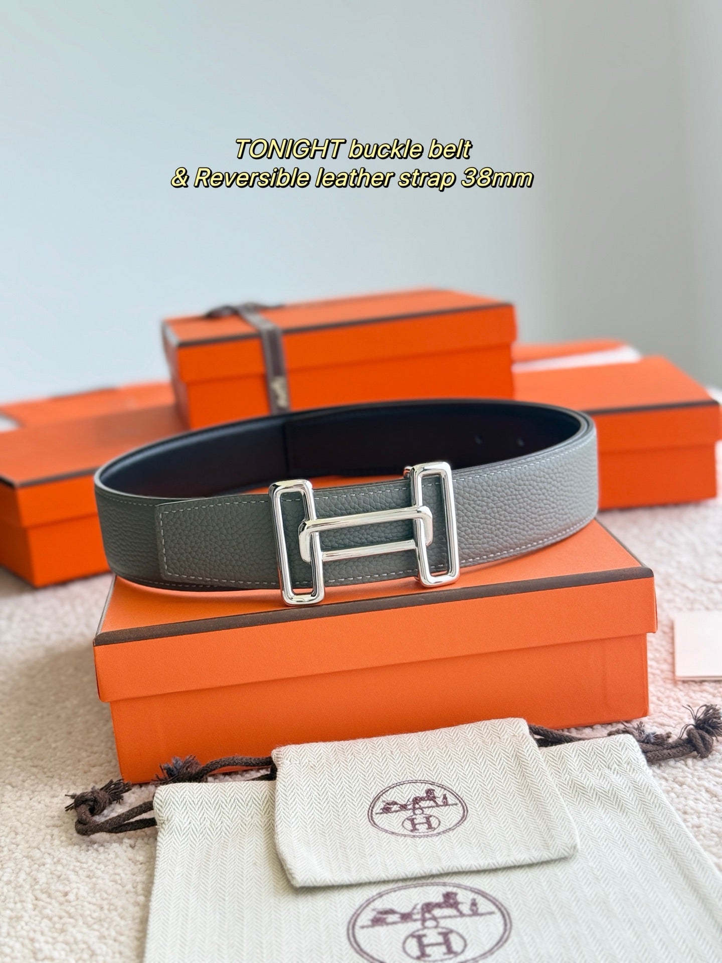 Hermes reversible leather belt, dark gray strap with silver rectangular buckle and keeper