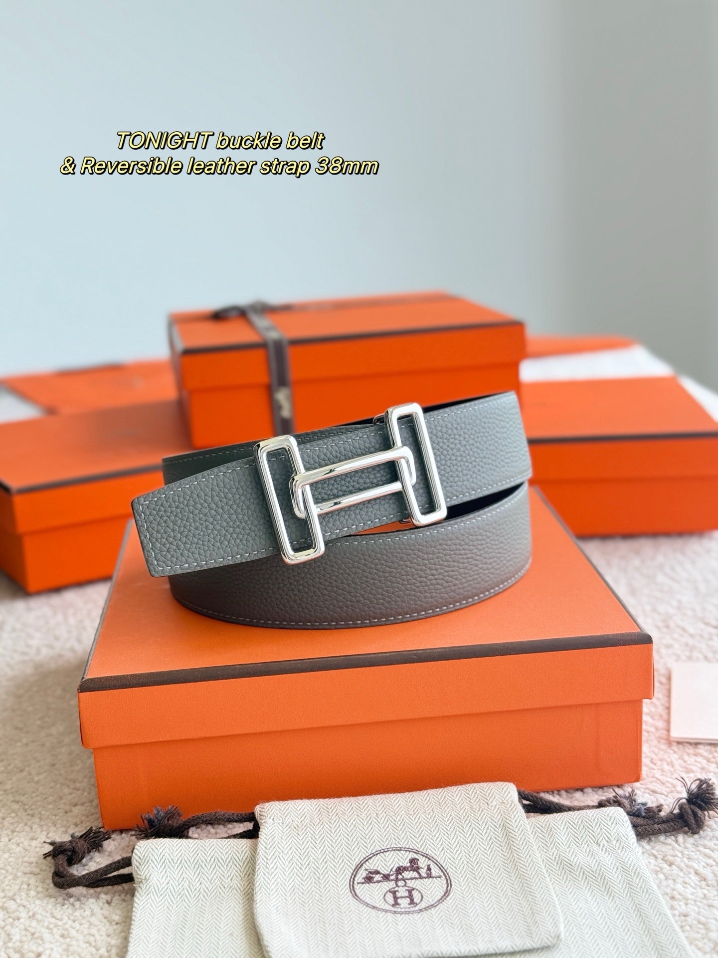 Hermes reversible leather belt, light gray front strap with silver buckle on dark base