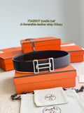 Hermes belt in dark leather with silver-toned buckle, front view