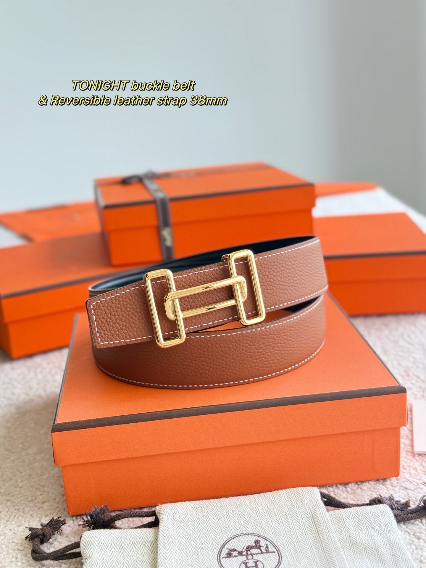 Reversible leather belt with gold-tone buckle, brown leather strap with keeper
