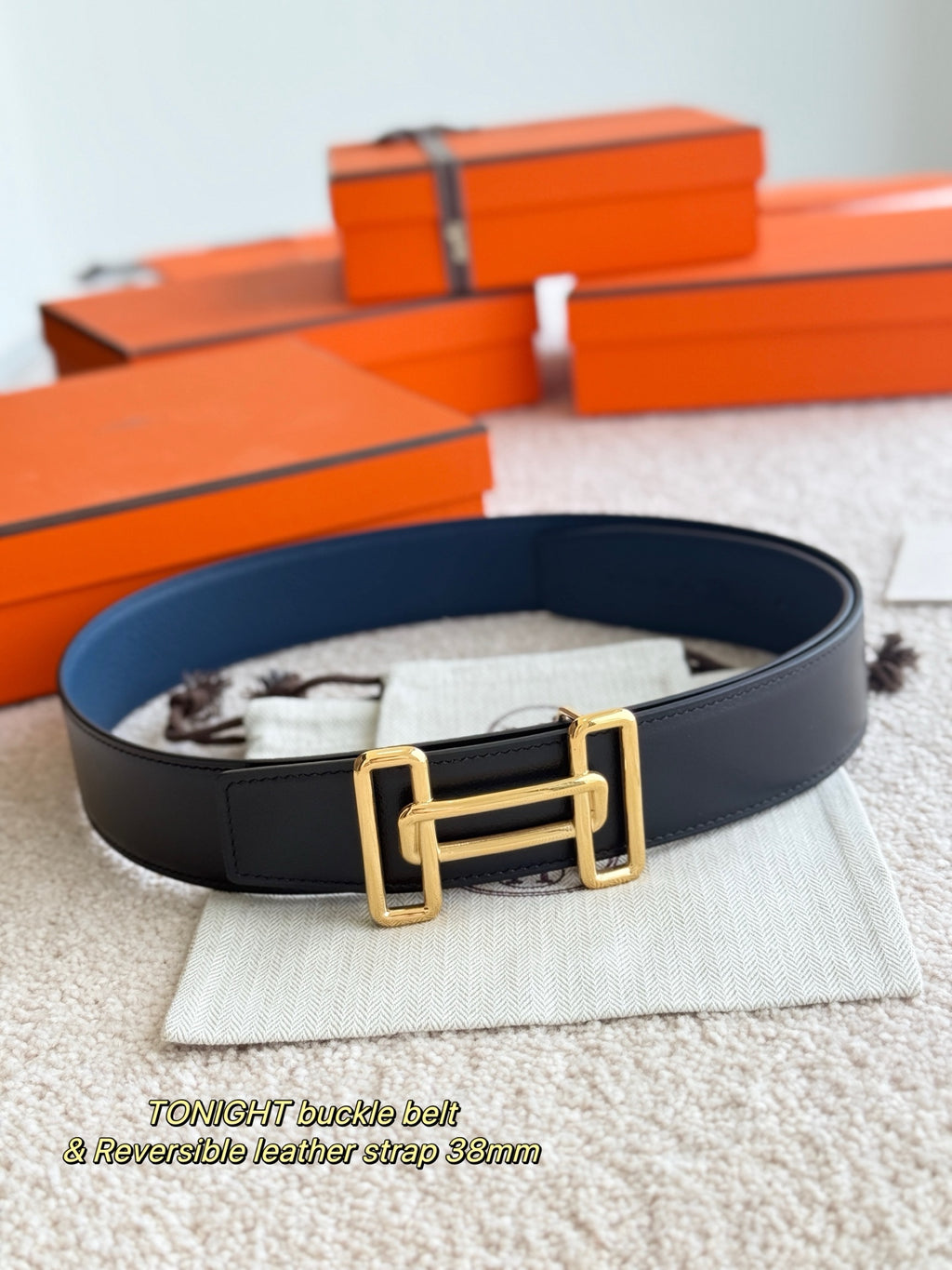 Blue leather belt with gold-tone rectangular buckle