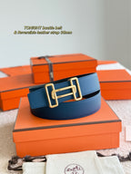 Blue leather belt with gold-tone double buckle