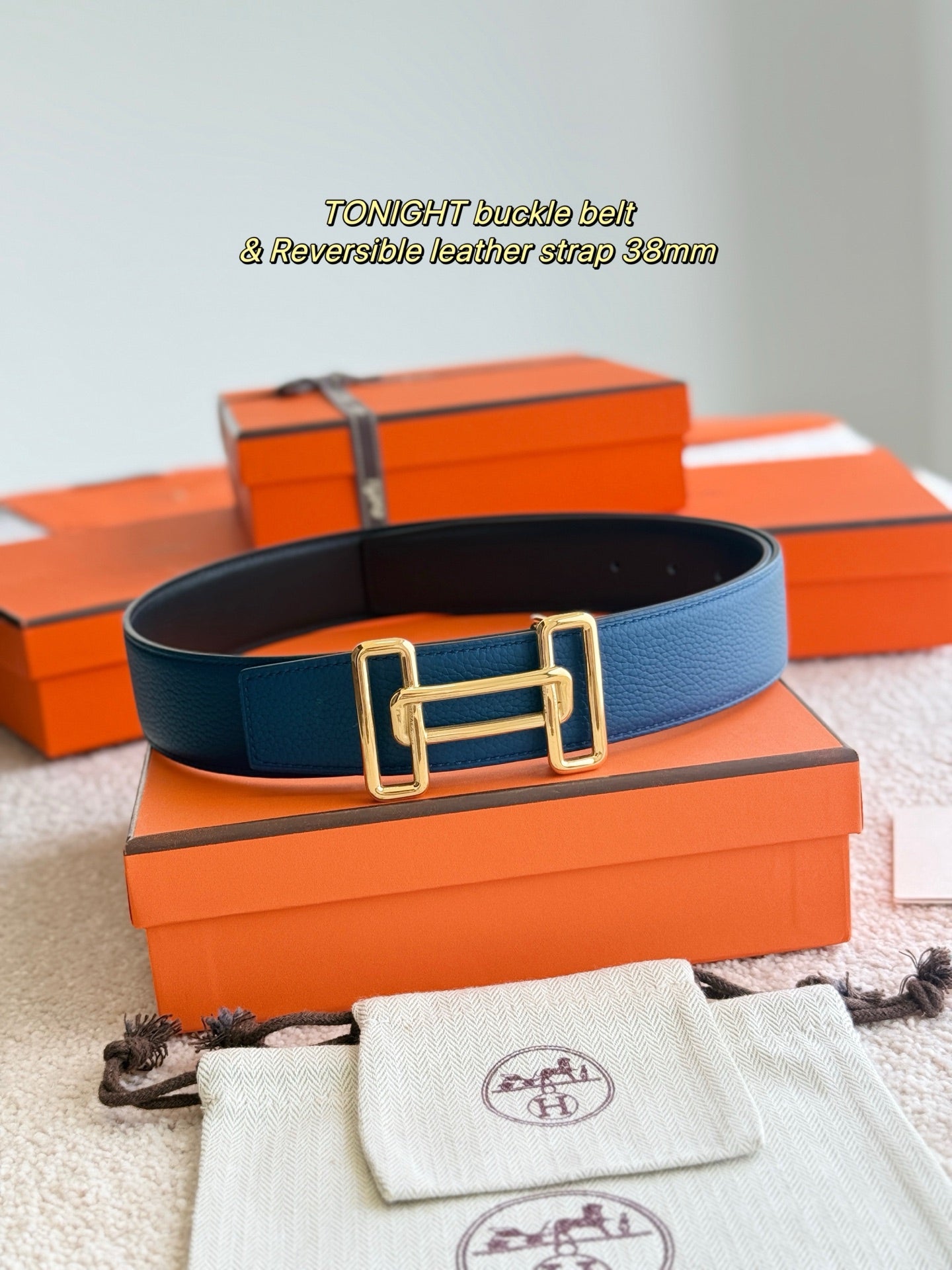 Navy leather belt with gold-tone double buckle