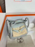Hermes light blue leather mini bag with small crossbody accessory and gold hardware