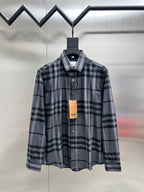 Plaid button-up shirt with dark and light gray check pattern, front view, long sleeves