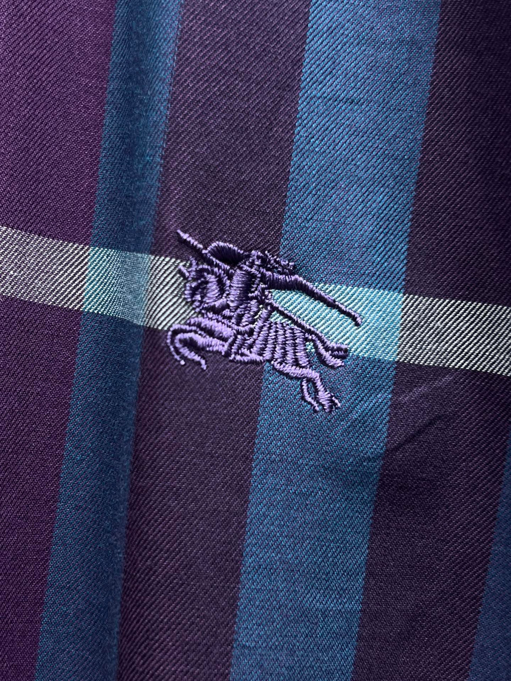 Burberry logo embroidery on plaid fabric, purple and blue