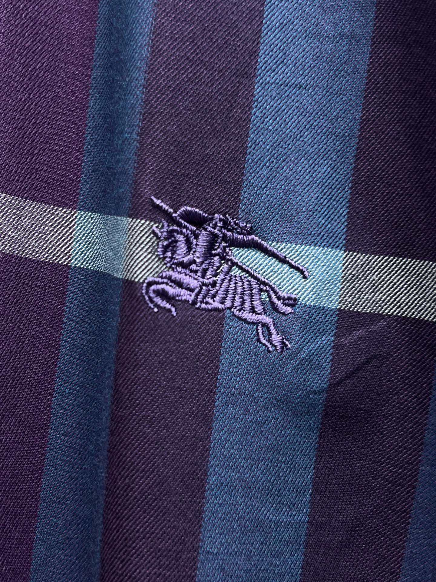 Burberry logo embroidery on plaid fabric, purple and blue