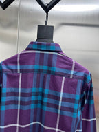 Back of long-sleeve plaid shirt with vertical seams, purple and blue checks