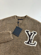 Brown knit sweater with buttoned collar and white LV monogram applique