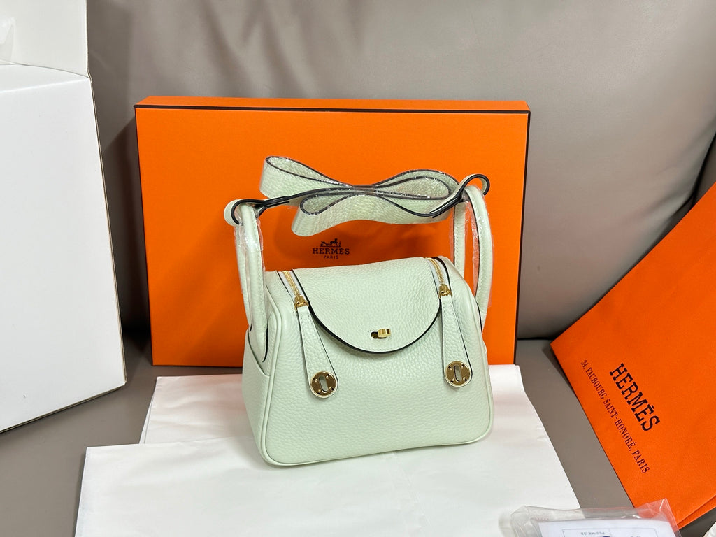 Hermes mint leather handbag with front flap and top handle