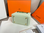 Hermes mint leather handbag with top handle and gold-tone corner feet